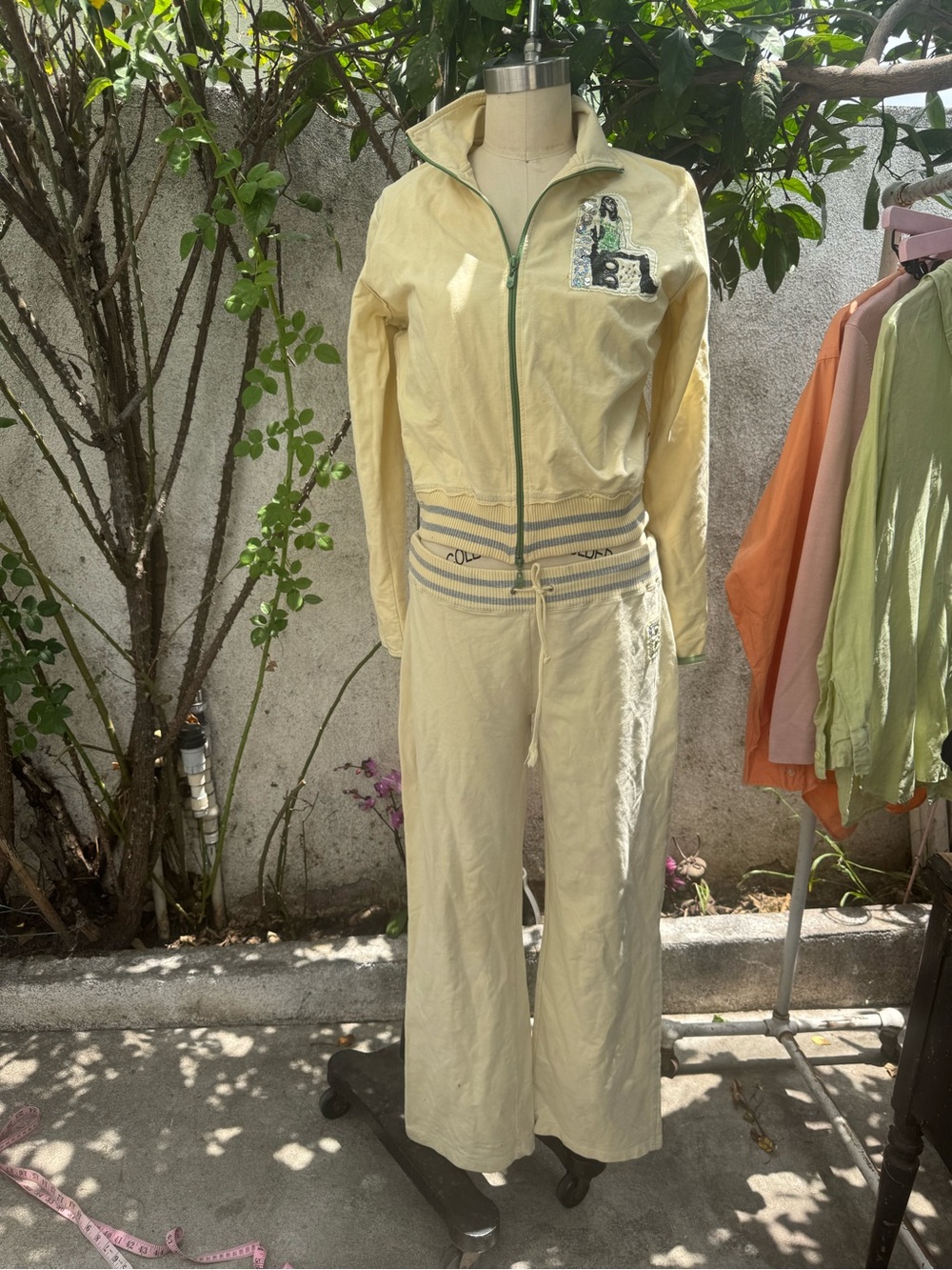BCBGMaxAzria Light Cream Zip-Front Jumpsuit with Embroidered Patch
